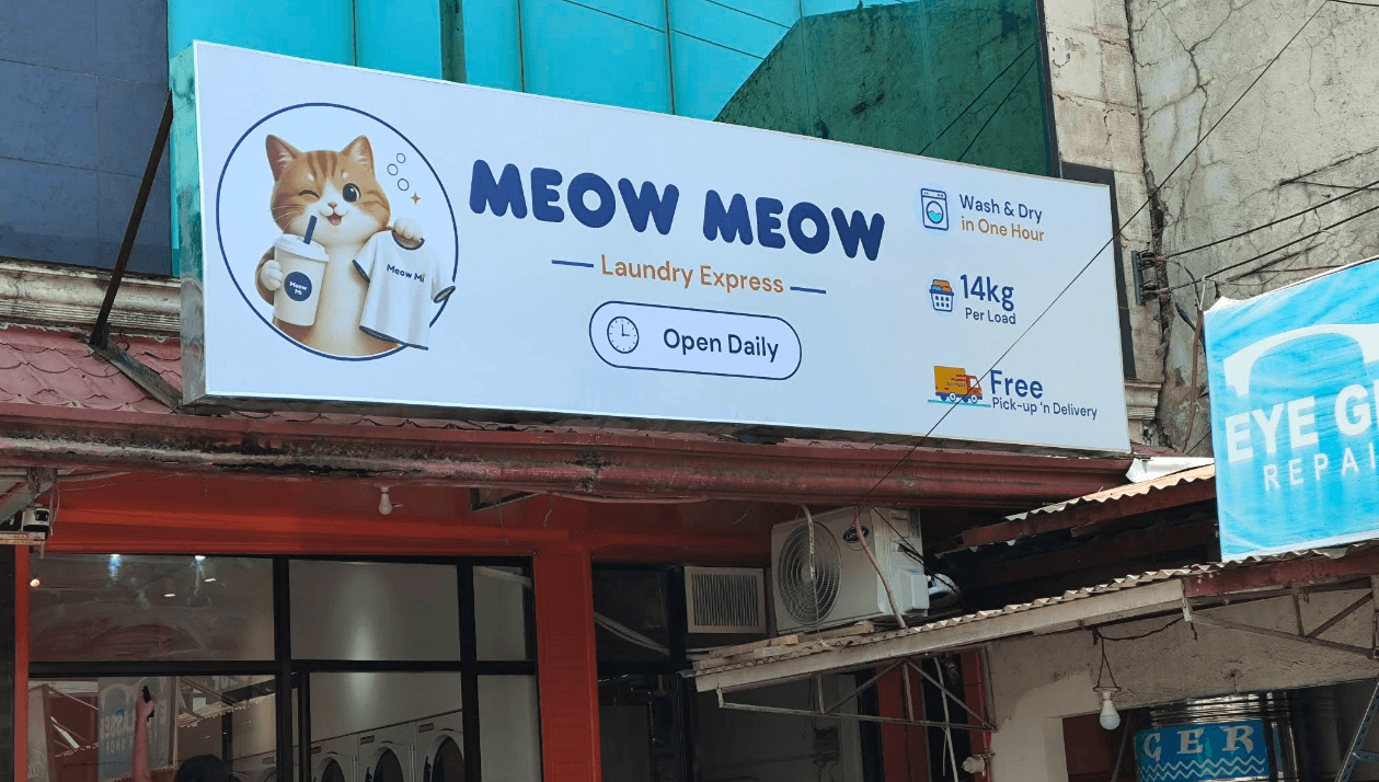 Meow Meow Laundry Express storefront sign at EPJ Building, Basak-Marigondon
